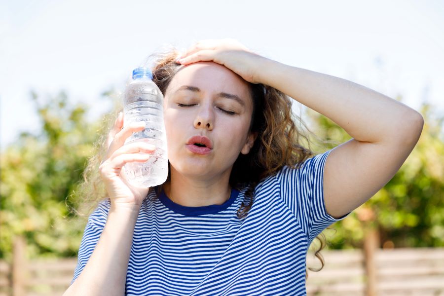 Woman staying cool in a heat wave
